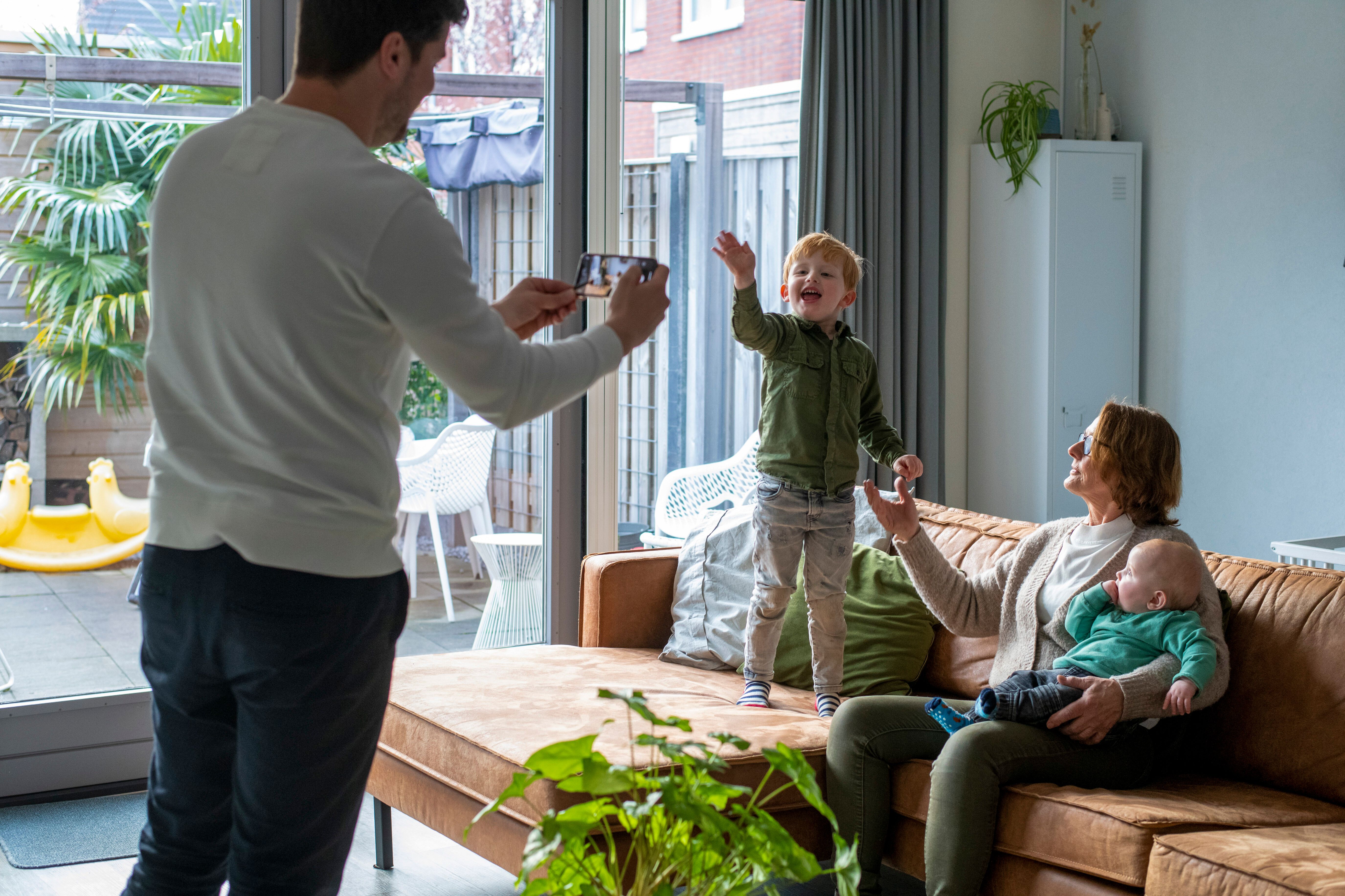 family-enjoying-time-together-in-the-living-room-2024-08-19-21-27-12-utc.jpg